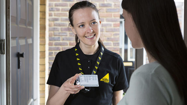 Engineer Showing Gas Safe ID Card